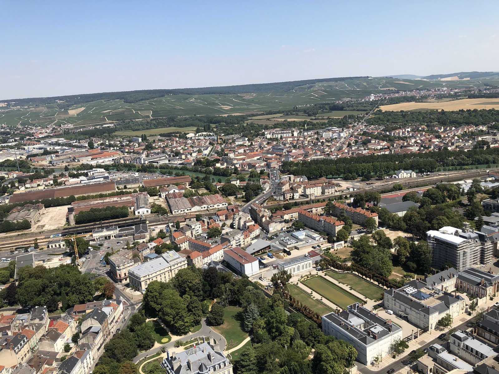 Aerial view of Epernay with vineyard hills in the distance